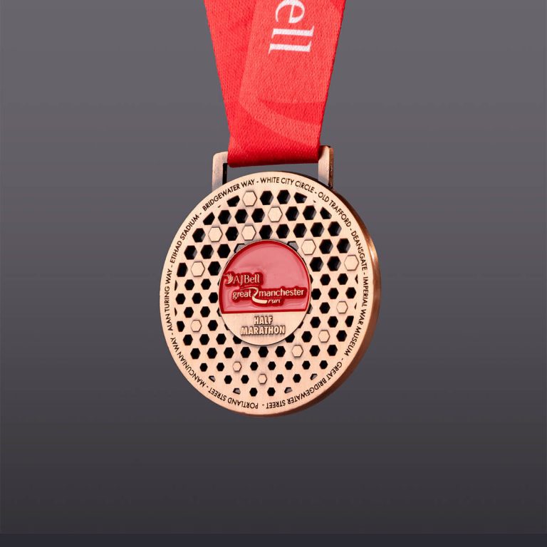 Great Manchester Run half marathon 2025 finisher medal back.